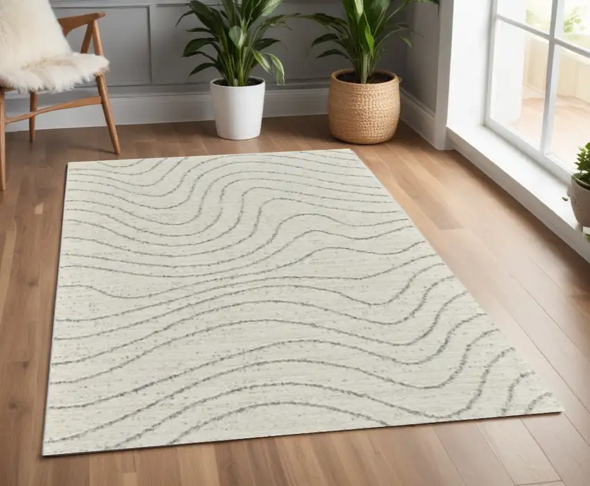 Cream and Beige Abstract Area Rug Photo 1