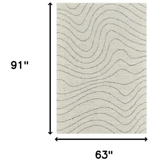 Cream and Beige Abstract Area Rug Photo 7
