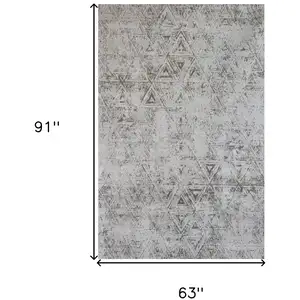 Photo of Cream and Beige Abstract Area Rug