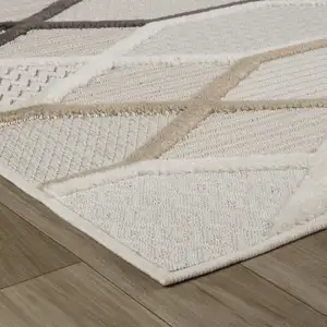 Photo of Cream and Beige Abstract Distressed Area Rug