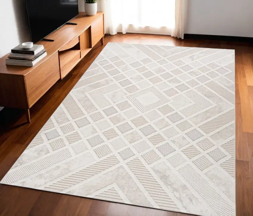 Cream and Beige Abstract Distressed Area Rug Photo 1
