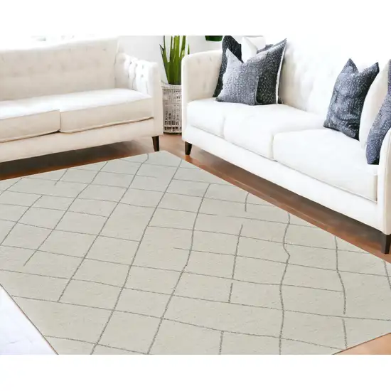 Cream and Beige Abstract Distressed Area Rug Photo 1