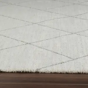 Photo of Cream and Beige Abstract Distressed Area Rug