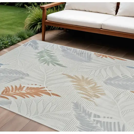 Cream and Beige Botanical Leaves Distressed Indoor Outdoor Area Rug Photo 1