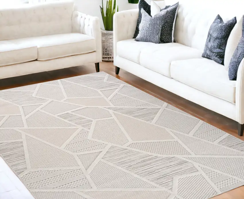 Cream and Beige Geometric Distressed Area Rug Photo 1