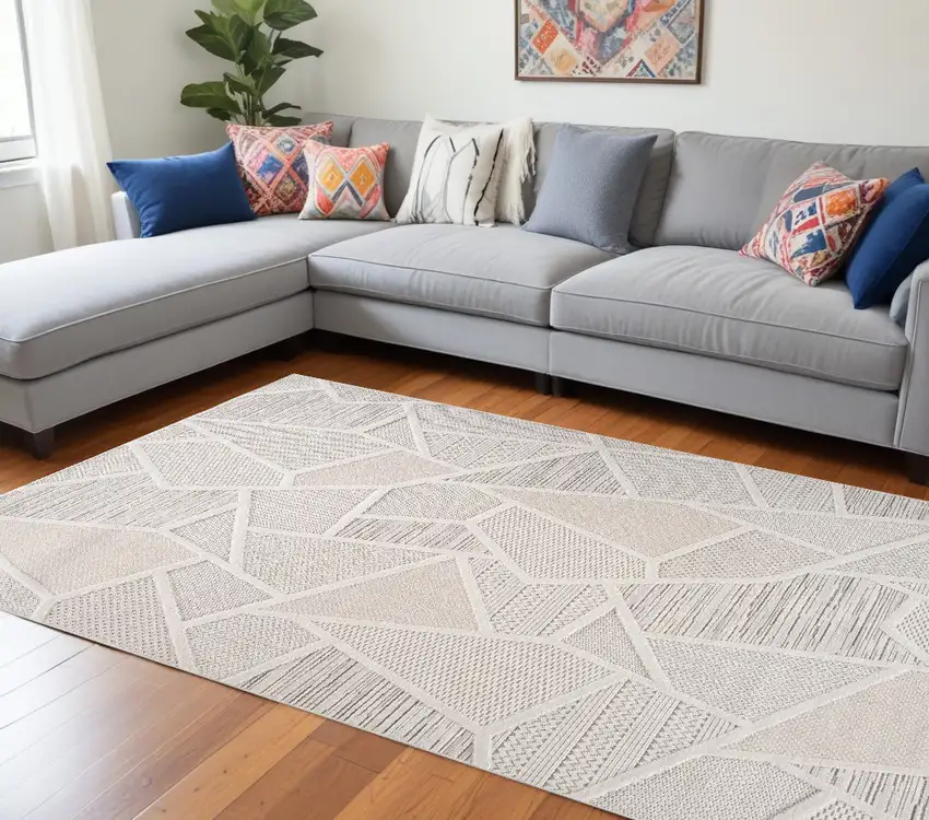 Cream and Beige Geometric Distressed Area Rug Photo 1