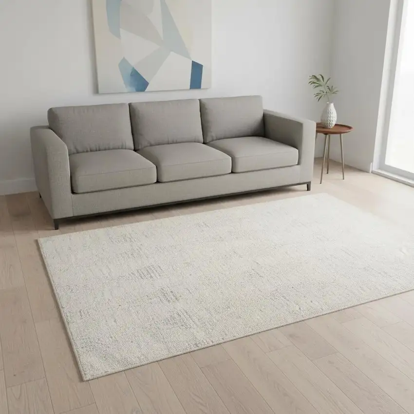 Cream and Beige Geometric Distressed Area Rug Photo 1