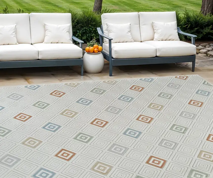 Cream and Beige Geometric Distressed Indoor Outdoor Area Rug Photo 1
