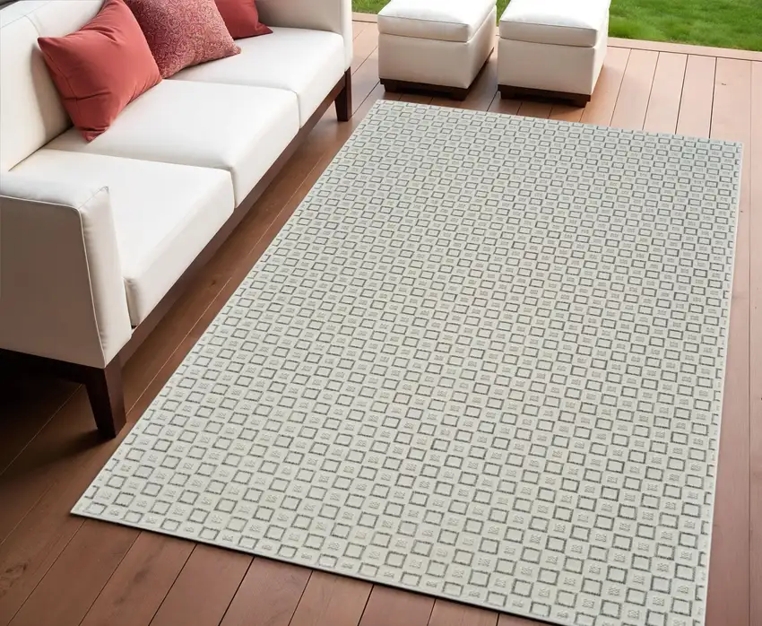 Cream and Beige Geometric Distressed Indoor Outdoor Area Rug Photo 1