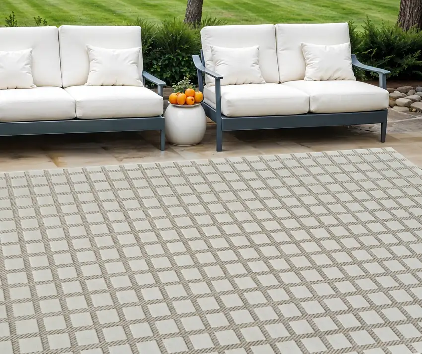 Cream and Beige Geometric Distressed Indoor Outdoor Area Rug Photo 1