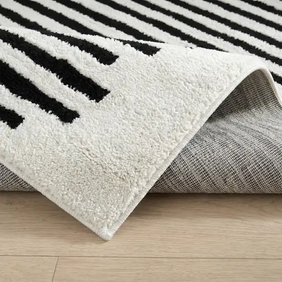 Cream and Black Abstract Distressed Area Rug Photo 2