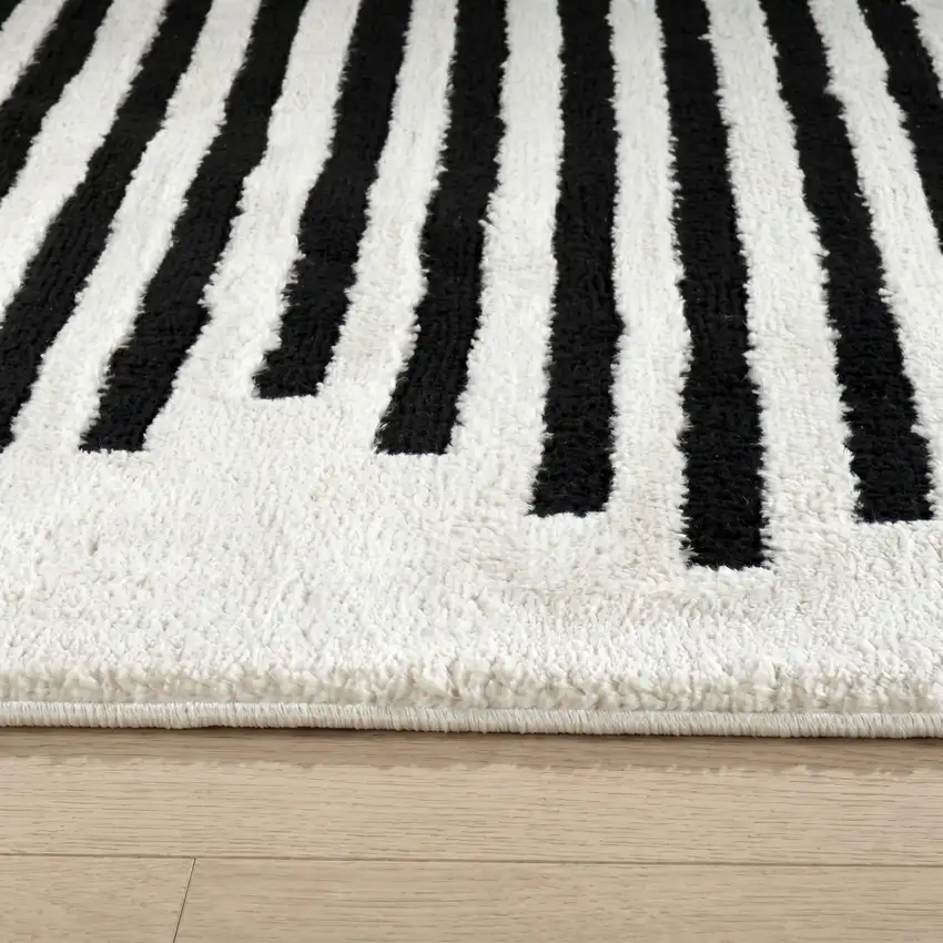 Cream and Black Abstract Distressed Area Rug Photo 3