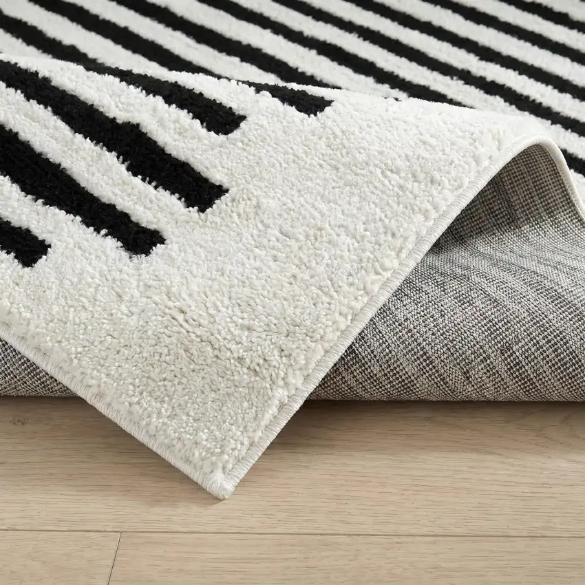 Cream and Black Abstract Distressed Area Rug Photo 2