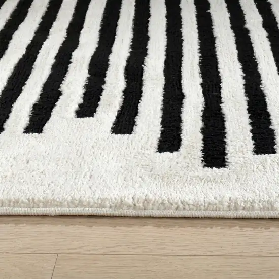 Cream and Black Abstract Distressed Area Rug Photo 3