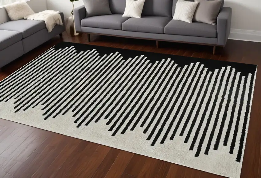Cream and Black Abstract Distressed Area Rug Photo 1