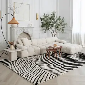 Photo of Cream and Black Abstract Distressed Area Rug