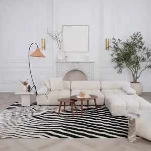 Photo of Cream and Black Abstract Distressed Area Rug