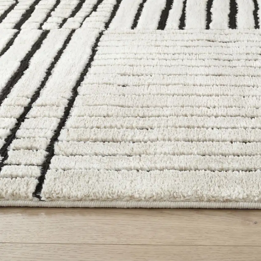 Cream and Black Abstract Distressed Area Rug Photo 4