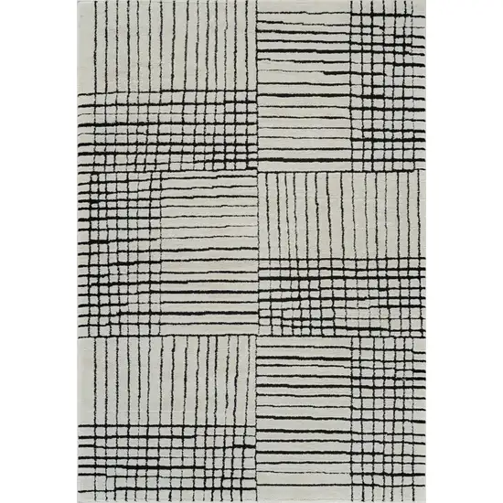 Cream and Black Abstract Distressed Area Rug Photo 3