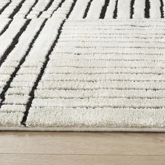 Cream and Black Abstract Distressed Area Rug Photo 4