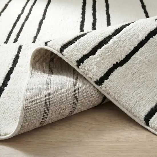 Cream and Black Abstract Distressed Area Rug Photo 6
