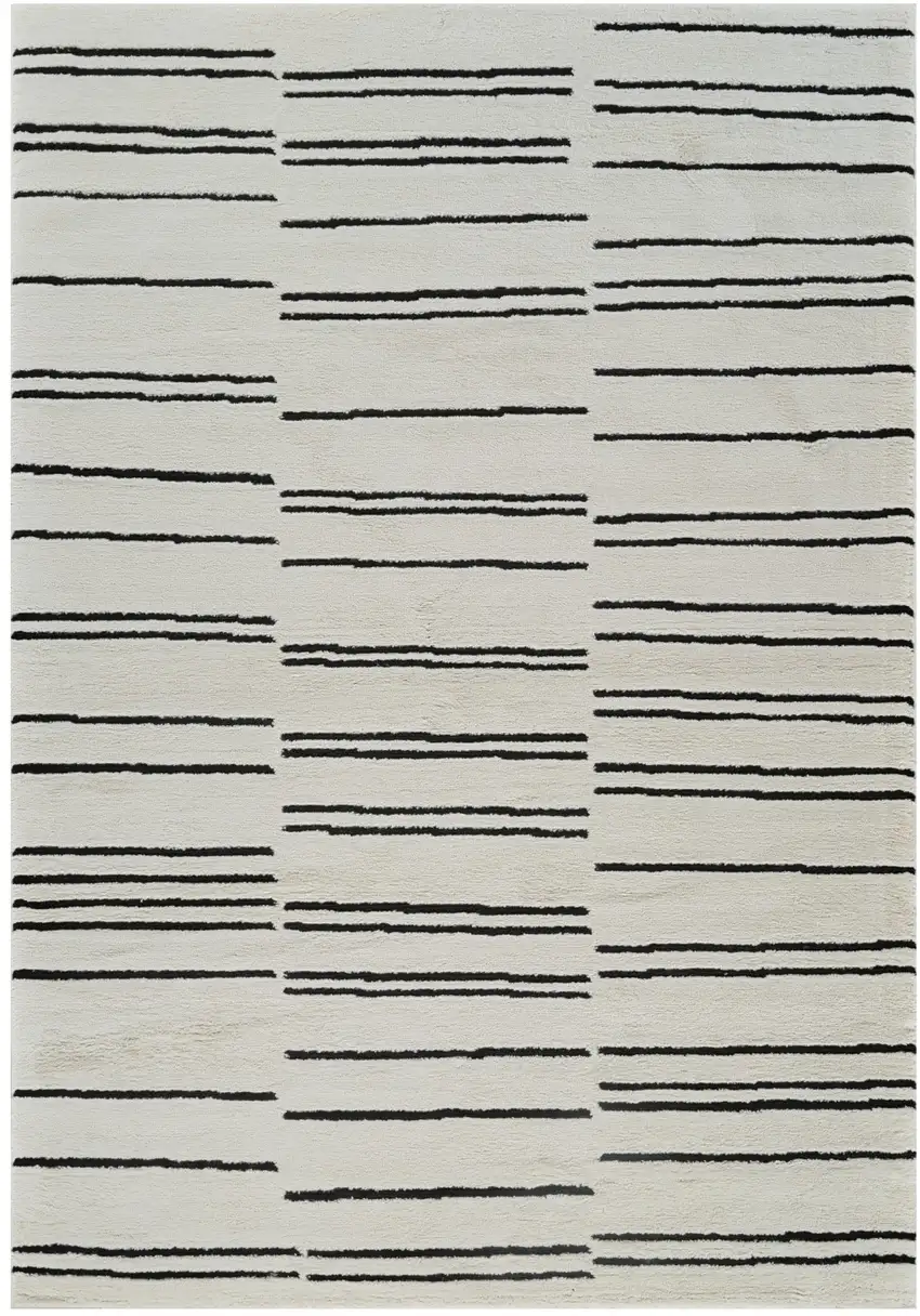 Cream and Black Abstract Distressed Area Rug Photo 1