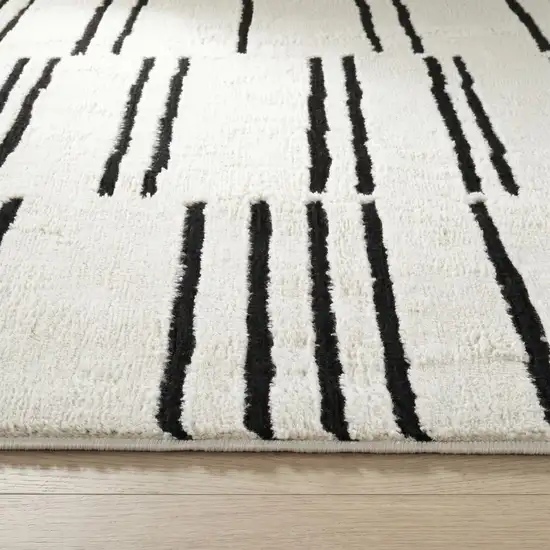Cream and Black Abstract Distressed Area Rug Photo 4