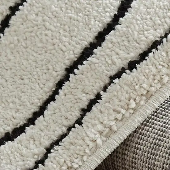 Cream and Black Abstract Distressed Area Rug Photo 2