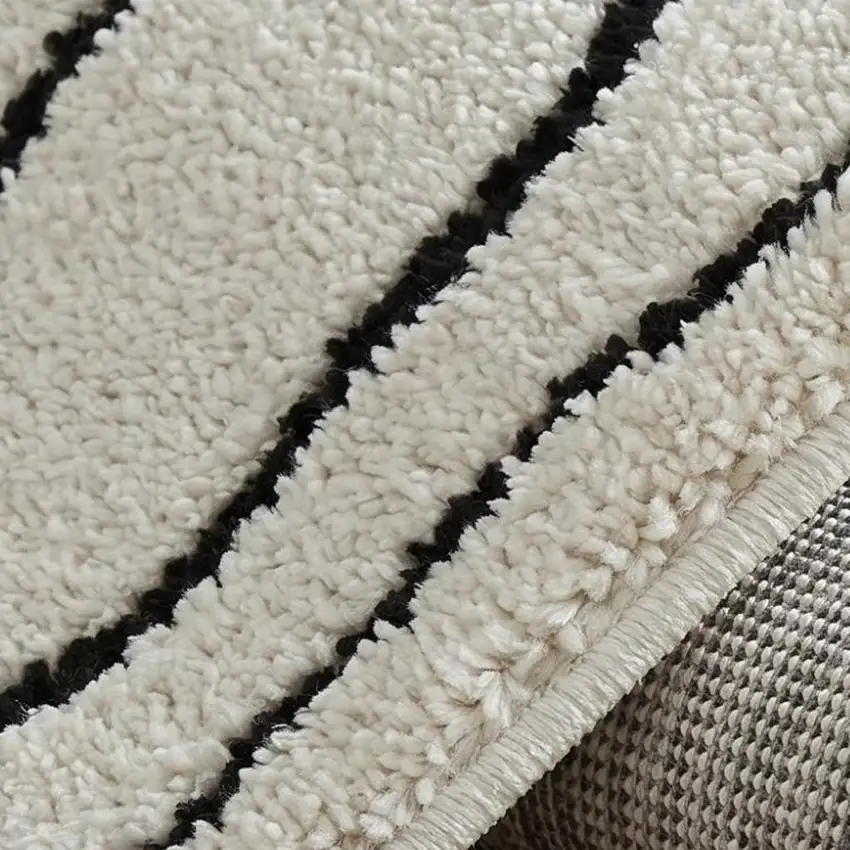 Cream and Black Abstract Distressed Area Rug Photo 2
