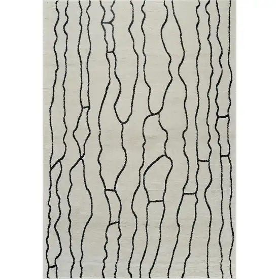 Cream and Black Abstract Distressed Area Rug Photo 5