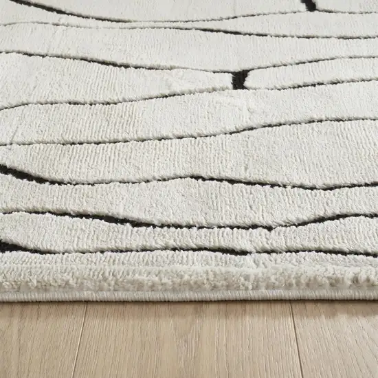 Cream and Black Abstract Distressed Area Rug Photo 6