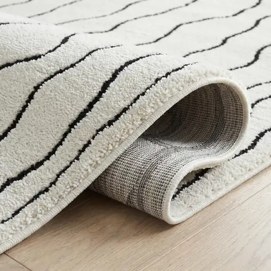 Cream and Black Abstract Distressed Area Rug Photo 3