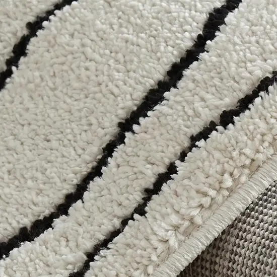 Cream and Black Abstract Distressed Area Rug Photo 2