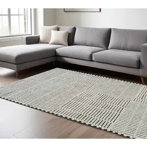 Photo of Cream and Black Abstract Distressed Area Rug
