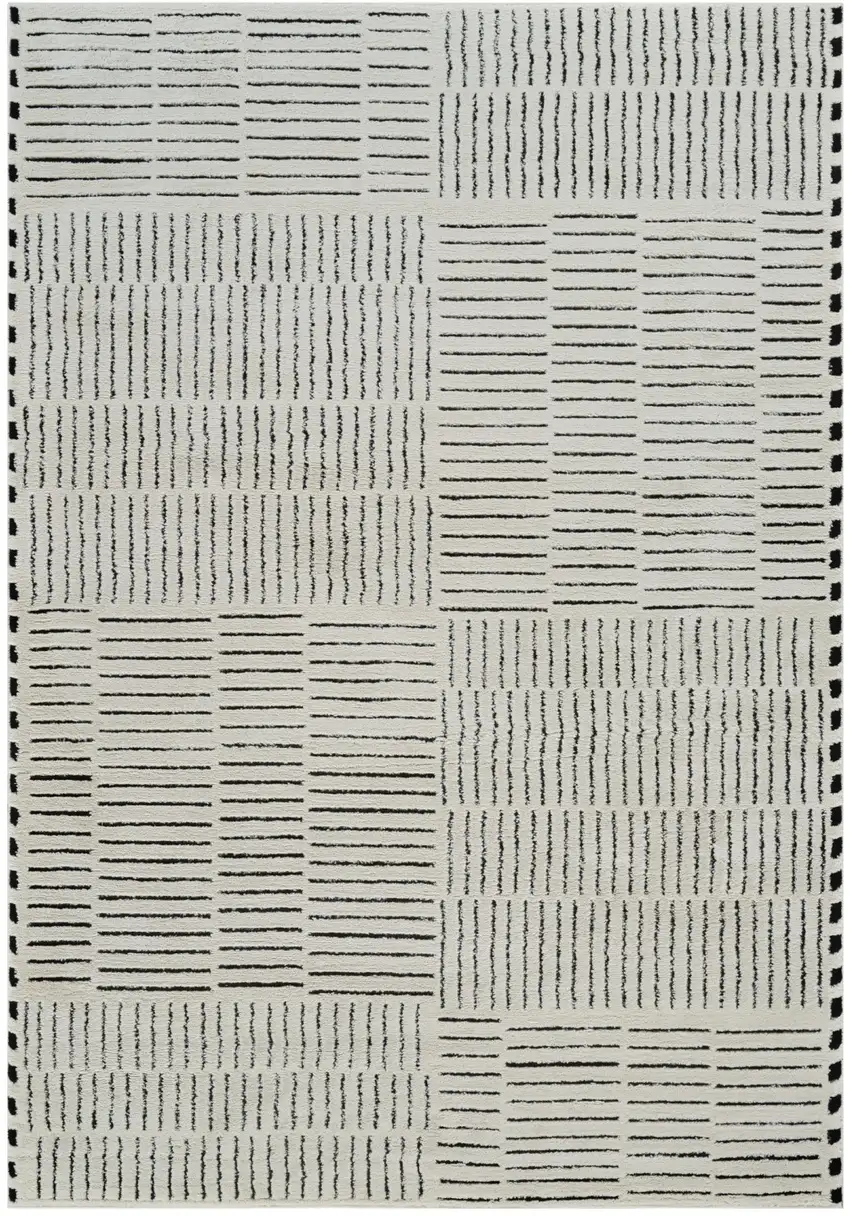 Cream and Black Abstract Distressed Area Rug Photo 1