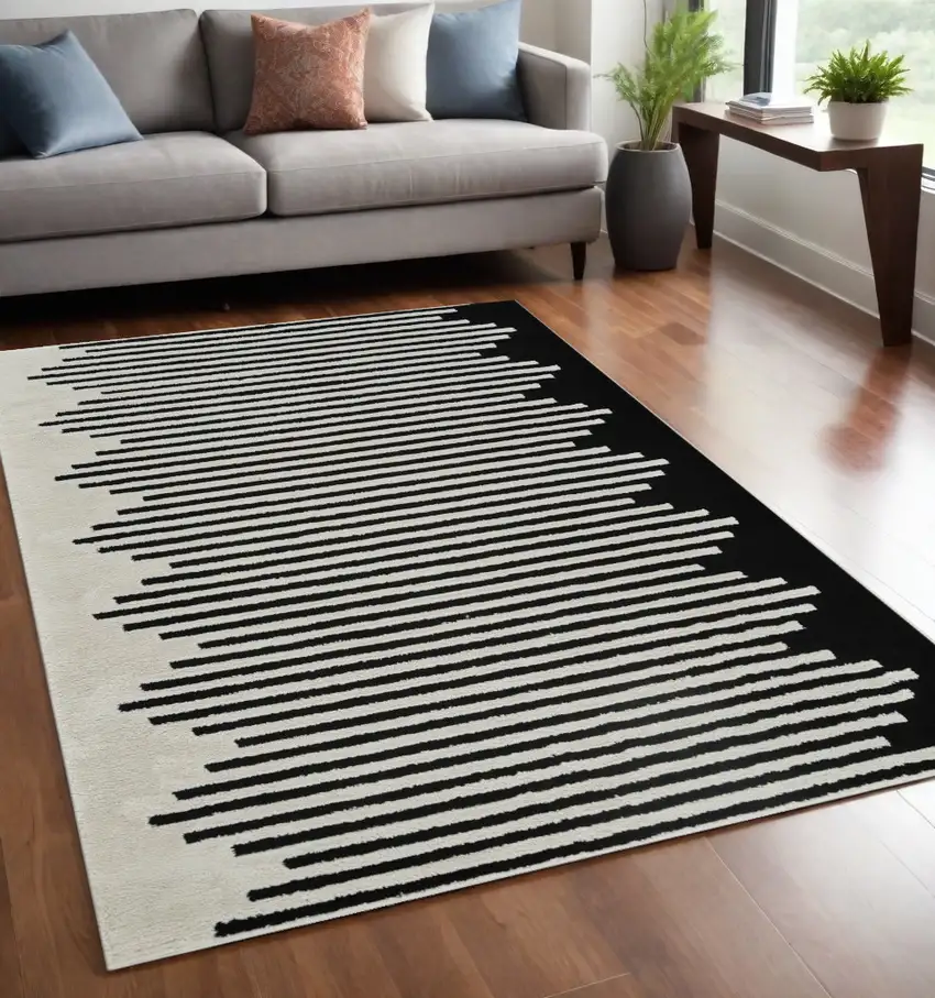 Cream and Black Abstract Worn Faded Area Rug Photo 2