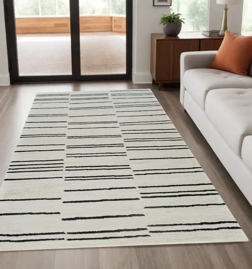 Cream and Black Abstract Worn Faded Area Rug Photo 2