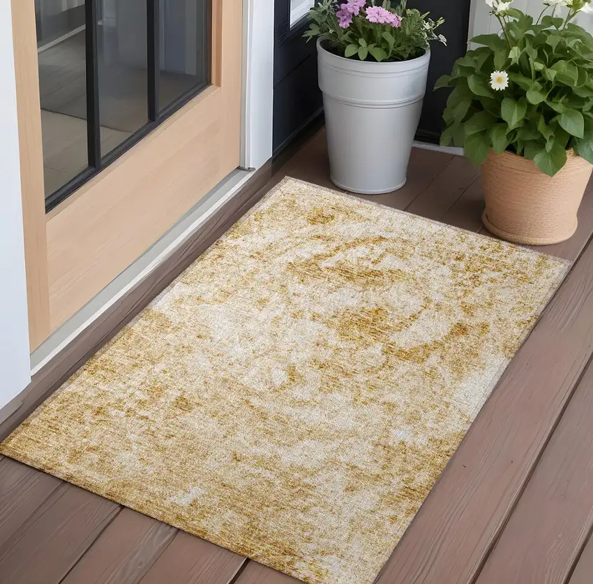 Cream and Gold Abstract Washable Non Skid Indoor Outdoor Area Rug Photo 1