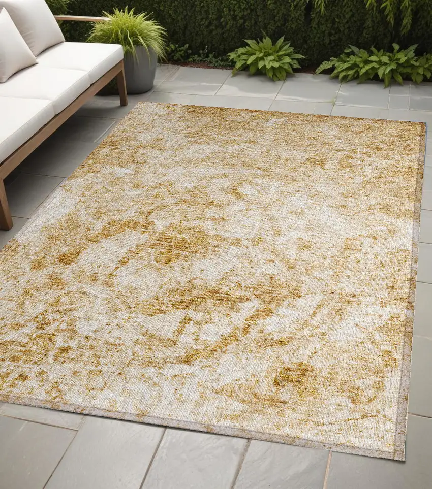 Cream and Gold Abstract Washable Non Skid Indoor Outdoor Area Rug Photo 1