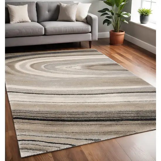 Cream and Tan Abstract Marble Area Rug Photo 1