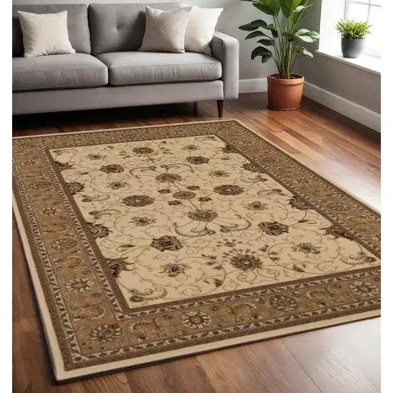 Beige And Ivory Oriental Area Rug Photo 1