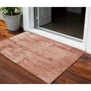 Photo of Crimson And Ivory Abstract Washable Indoor Outdoor Area Rug
