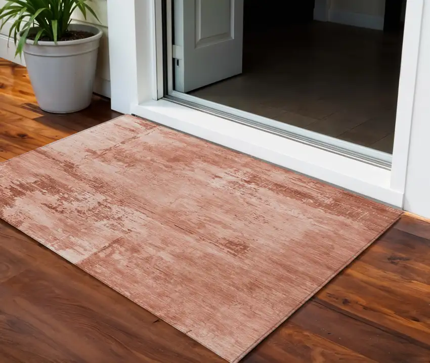 Crimson And Ivory Abstract Washable Indoor Outdoor Area Rug Photo 1