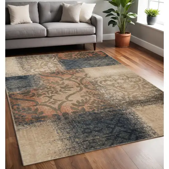 Blue And Ivory Damask Distressed Area Rug Photo 1