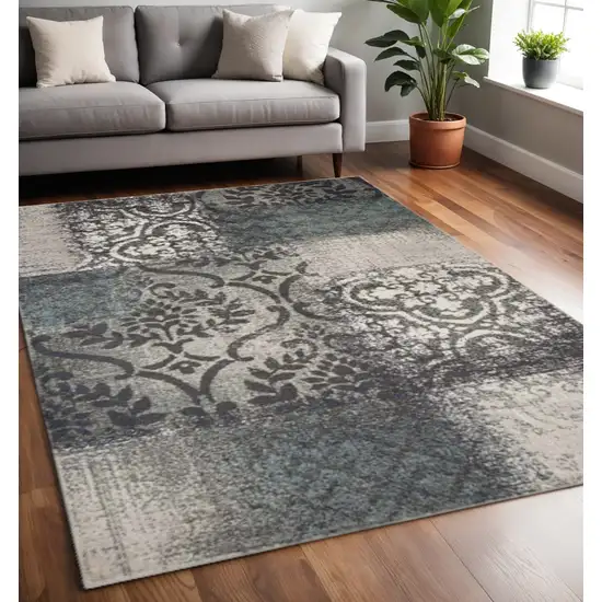 Teal And Ivory Damask Distressed Area Rug Photo 1