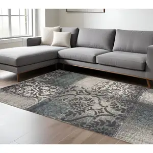 Photo of Damask Distressed Stain Resistant Area Rug