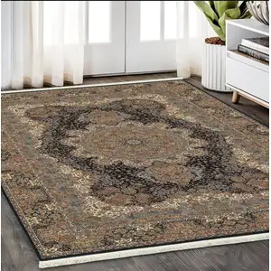 Photo of Dark Blue Black And Teal Medallion Area Rug With Fringe