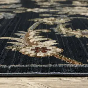 Photo of Dark Blue Tan And Green Oriental Area Rug With Fringe