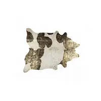 Photo of Dark Brown White and Gold Natural Cowhide Area Rug