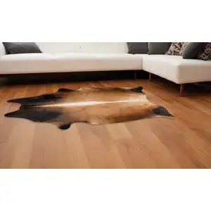 Photo of Dark Brown and Tan Genuine Cowhide Hand Knotted Area Rug